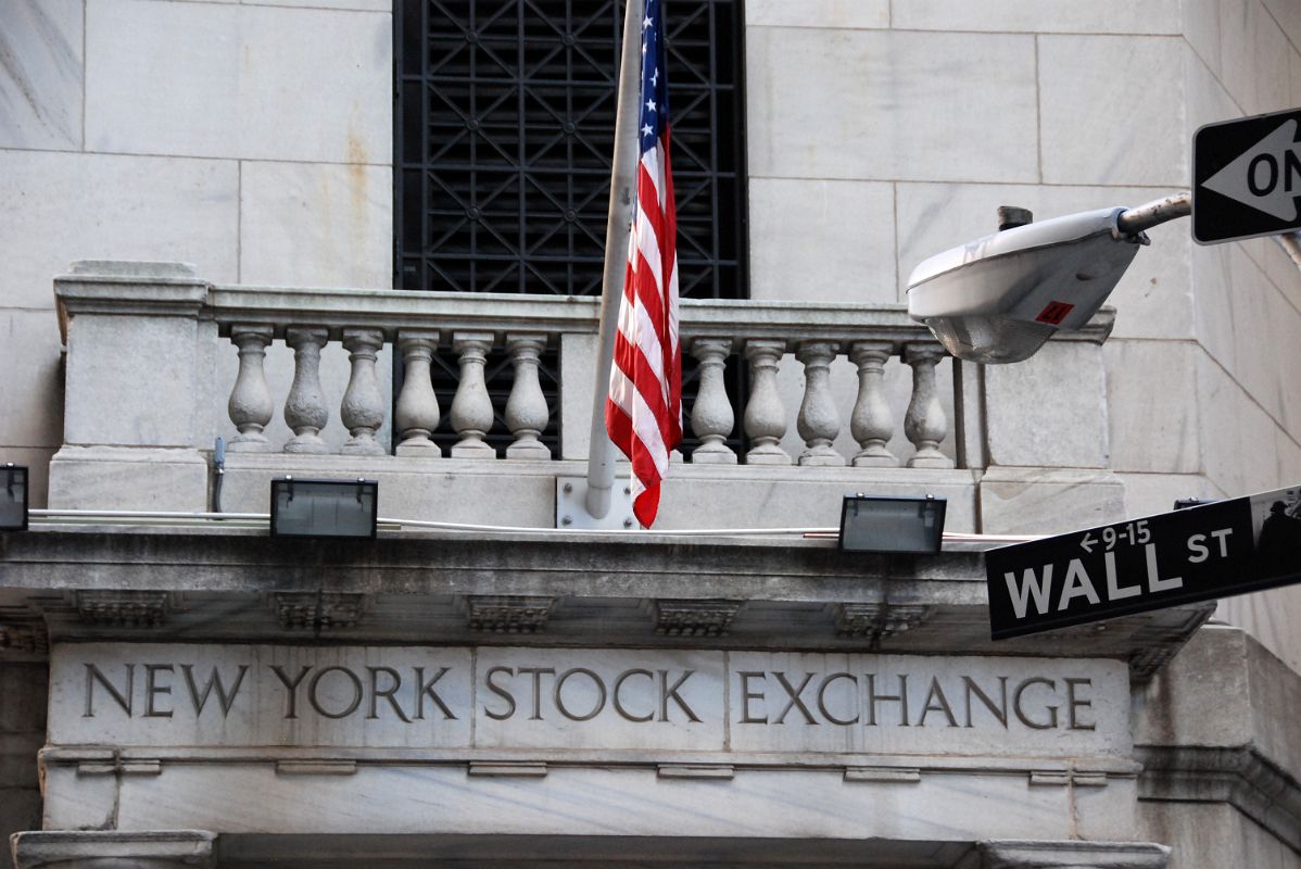 18-2 New York Stock Exchange And Wall St Signs In New York Financial District